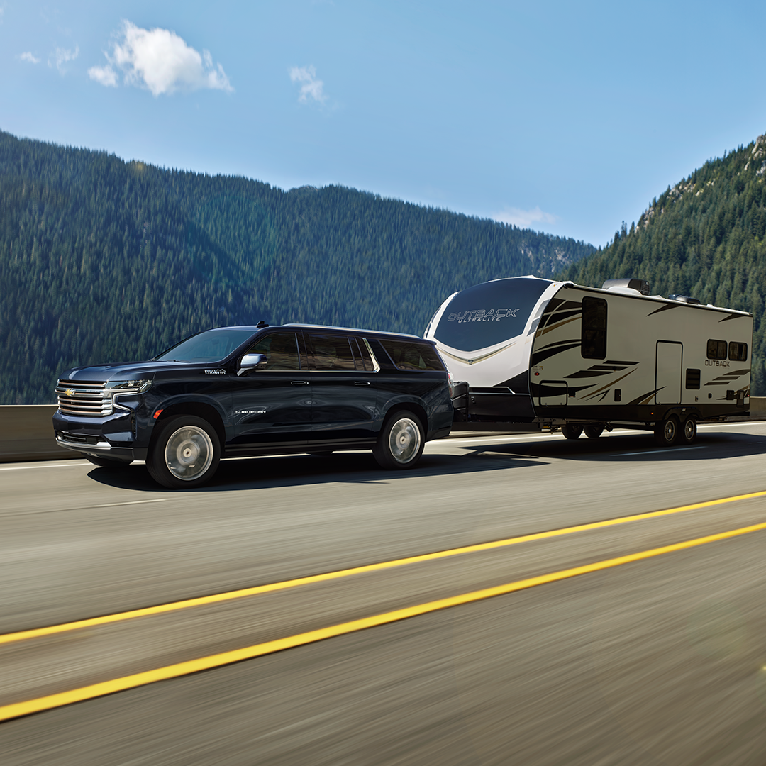 Chevy Suburban pulling a boat