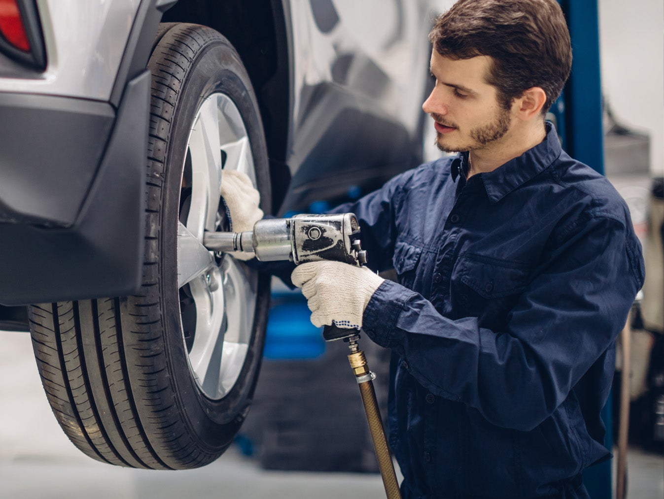 Mechanic working on a vehicle - Finnegan Chevrolet Buick GMC in Rosenberg TX